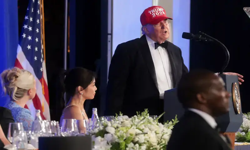 US President Donald Trump wears a “Trump 2028” cap as he delivers remarks at the White House Correspondents' Association Dinner at the Waldorf Astoria hotel in Washington, DC. - Reuters