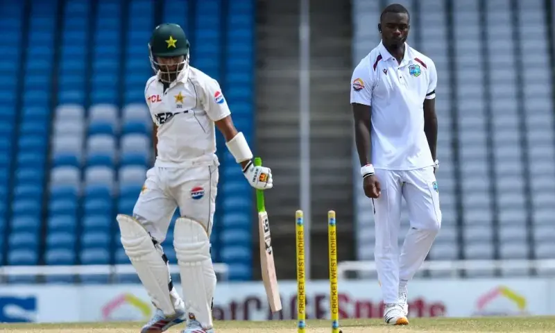 Khurram Shahzad of Pakistan is bowled by Jayden Seales of West Indies during the fourth day of the first Test at the Brian Lara Cricket Academy in Tarouba on July 28, 2026. - AFP