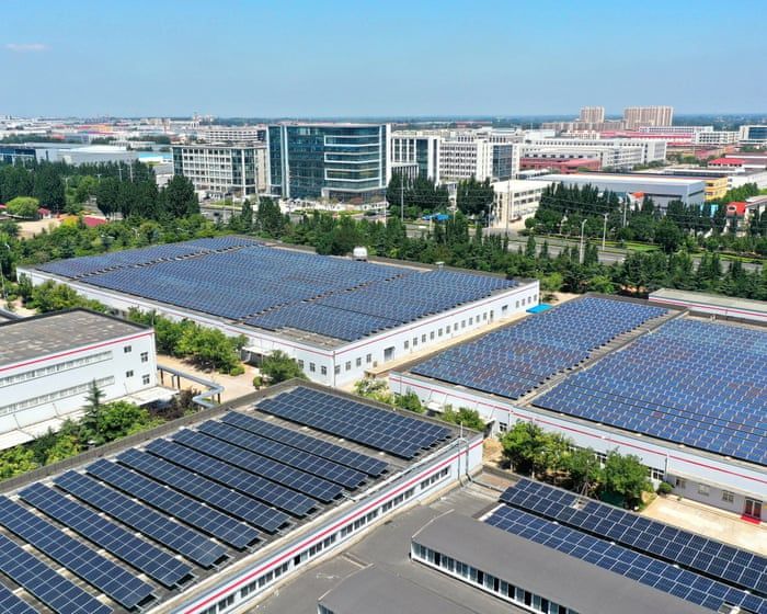 Solar panels arranged on the rooftop of an industrial park in Jimo, Qingdao, in eastern China's Shandong province. - AFP/Getty Images