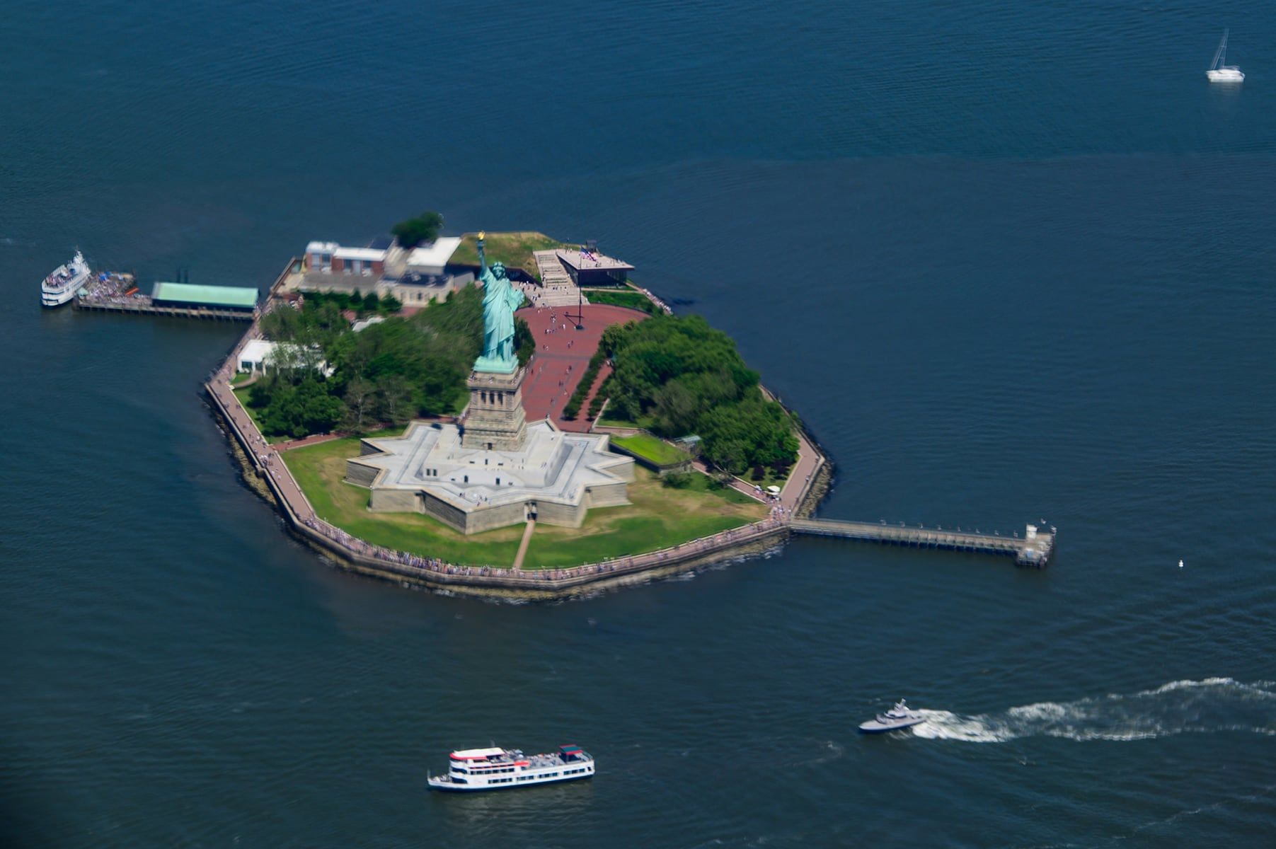 Aerial view of the Statue of Liberty on Liberty Island in New York Harbor, June 9, 2026. - AP Photo/Kelly Marsh, File