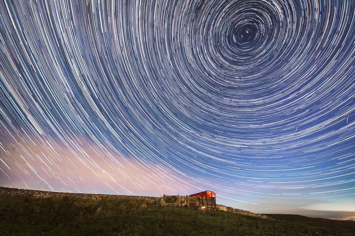 Timelapse image of the annual Perseid meteor shower seen from near Hawes in the Yorkshire Dales National Park - Danny Lawson/PA Archive