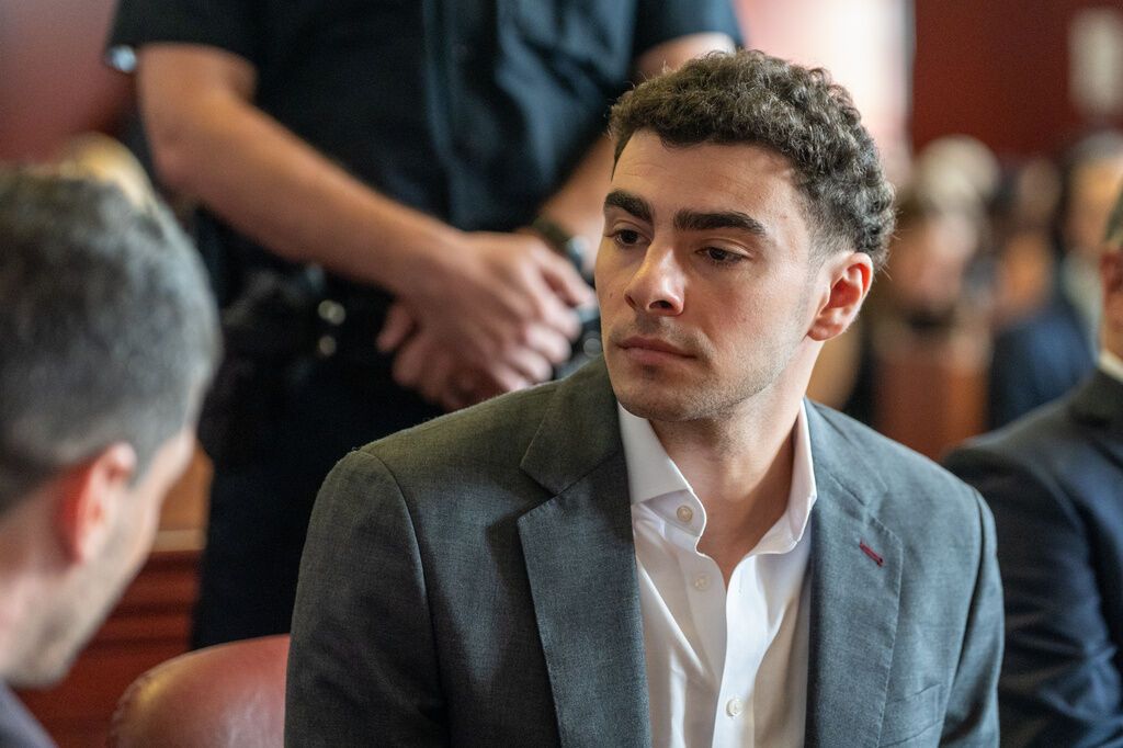 Luigi Mangione appears for a pre-trial hearing at Manhattan Criminal Court in New York on Aug. 11, 2026. - David Dee Delgado/Pool Photo via AP