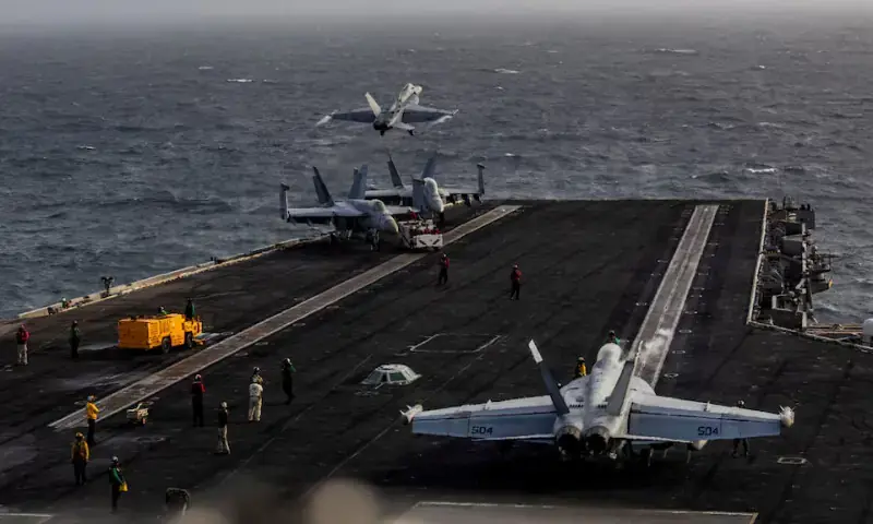 An F/A-18E Super Hornet launches from the flight deck of the USS Abraham Lincoln during the conflict with Iran. - Reuters