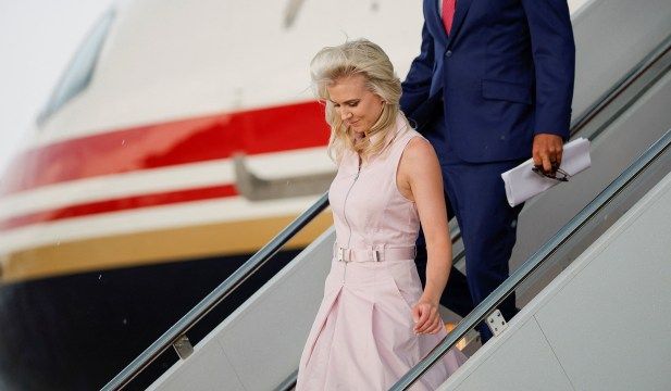 Natalie Harp, executive assistant to President Donald Trump, disembarks Air Force One upon arrival at Joint Base Andrews, in Md., July 27, 2026. - nationalreview.com