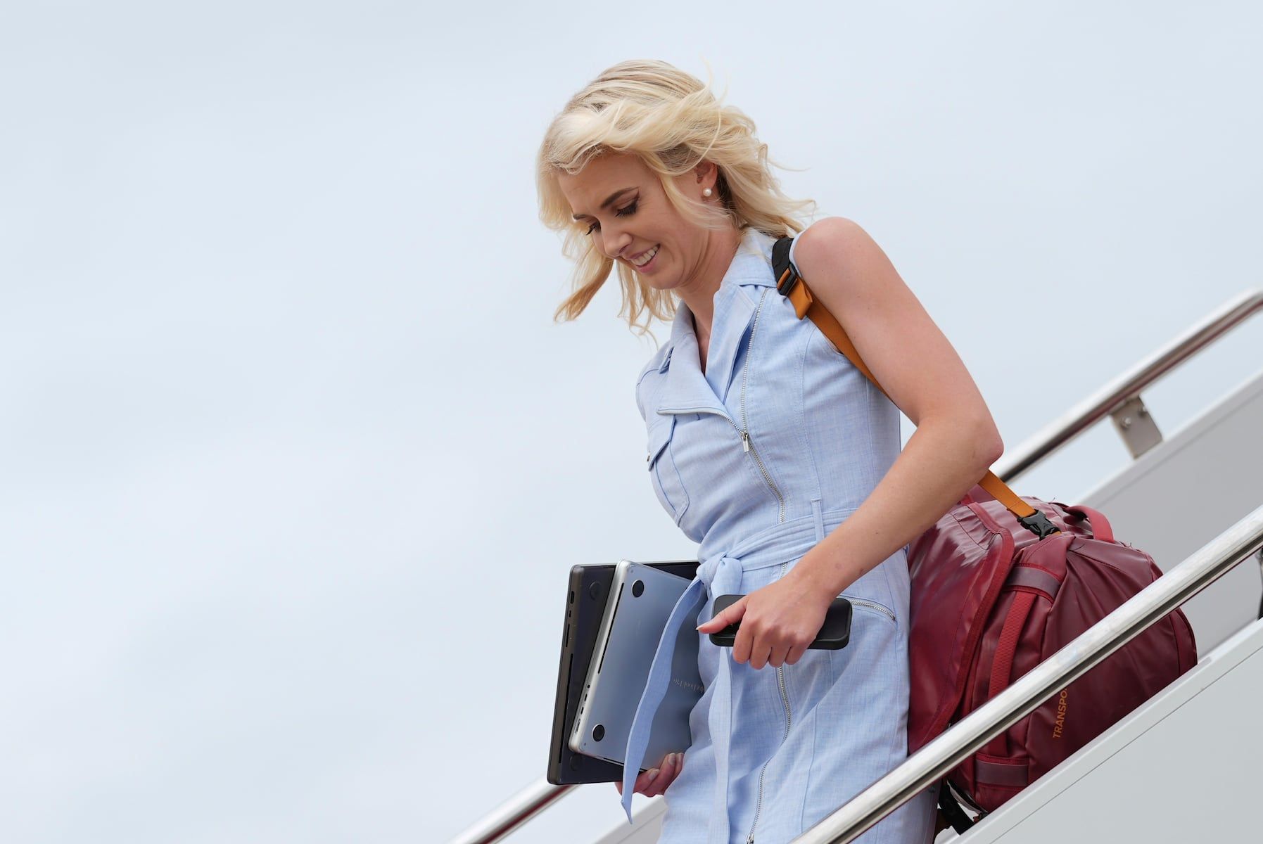 White House aide Natalie Harp disembarks Air Force One, Sunday, Aug. 16, 2026, at Joint Base Andrews, Md. - AP Photo/Julia Demaree Nikhinson