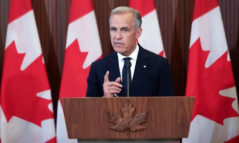 Canadian Prime Minister Mark Carney speaks at a press conference in Ottawa, Ontario, Canada on August 22, 2026, after a collapse in trade talks with the US. - AFP