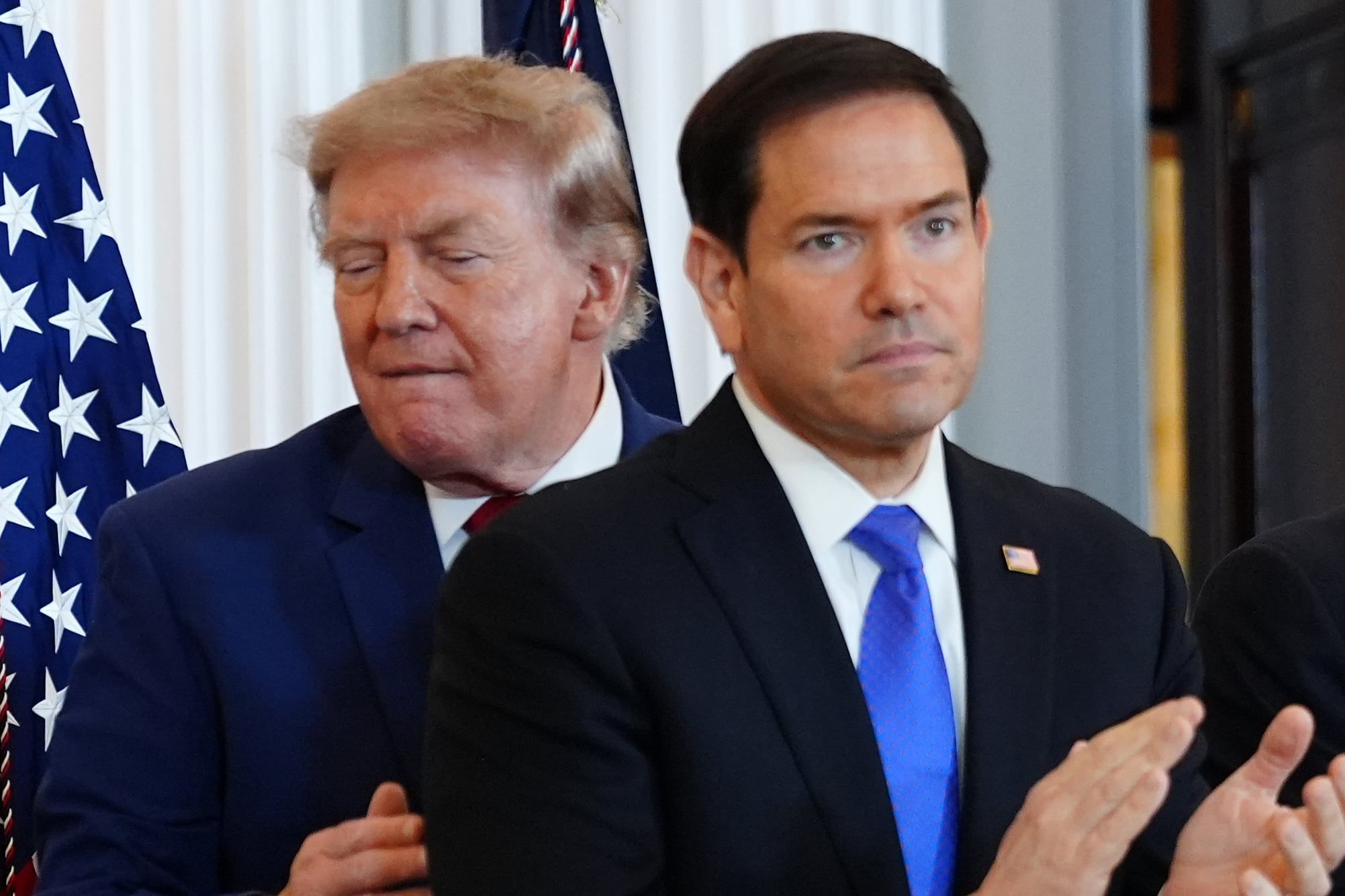 President Donald Trump walks past Secretary of State Marco Rubio at the State Department in Washington on Aug. 7, 2026. - AP Photo/Julia Demaree Nikhinson