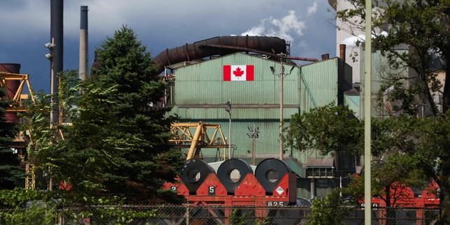 Coils of steel are seen at an ArcelorMittal Dofasco facility in Hamilton, Ontario, Canada, on August 24, 2026. - lemonde.fr