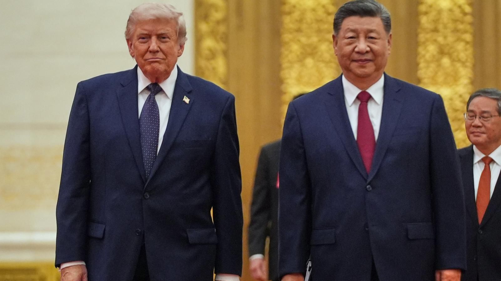 President Donald Trump and Chinese President Xi Jinping arrive at a state dinner in Beijing in May 2026. - AP Photo/Mark Schiefelbein