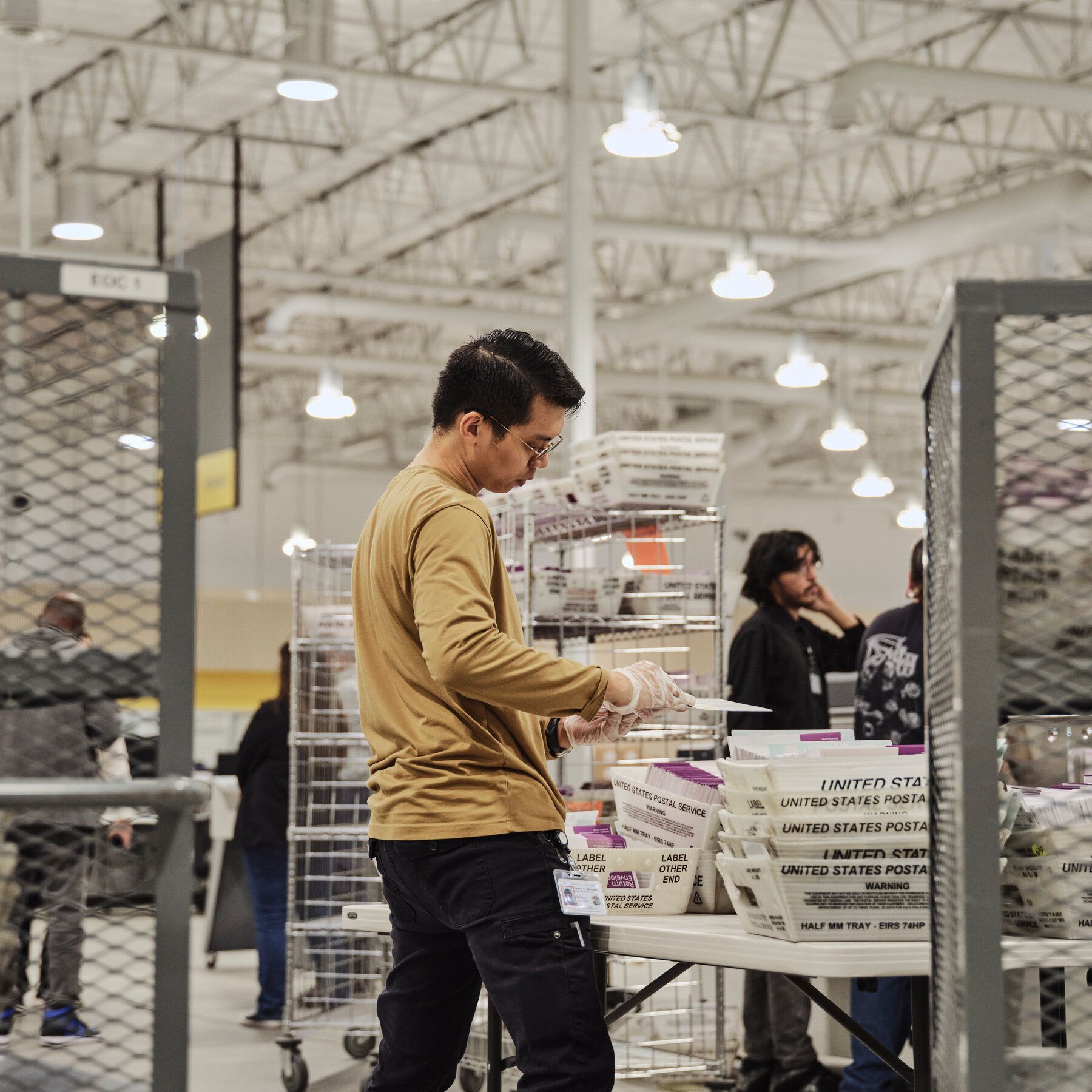 Workers sorted through ballots at a ballot processing facility in California last November. - nytimes.com
