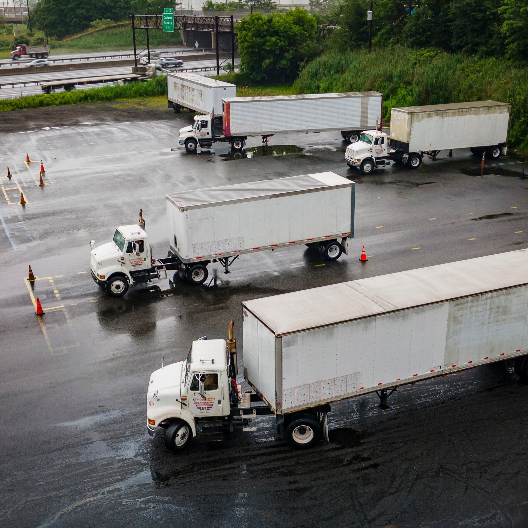 Trucking students practicing reverse parking at a driving school in New Jersey. - nytimes.com