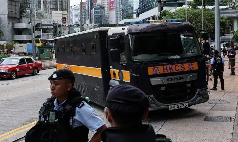 A prison van, believed to be carrying activist Joshua Wong, arrives at the High Court for a national security plea and sentencing hearing in Hong Kong, China. - Reuters