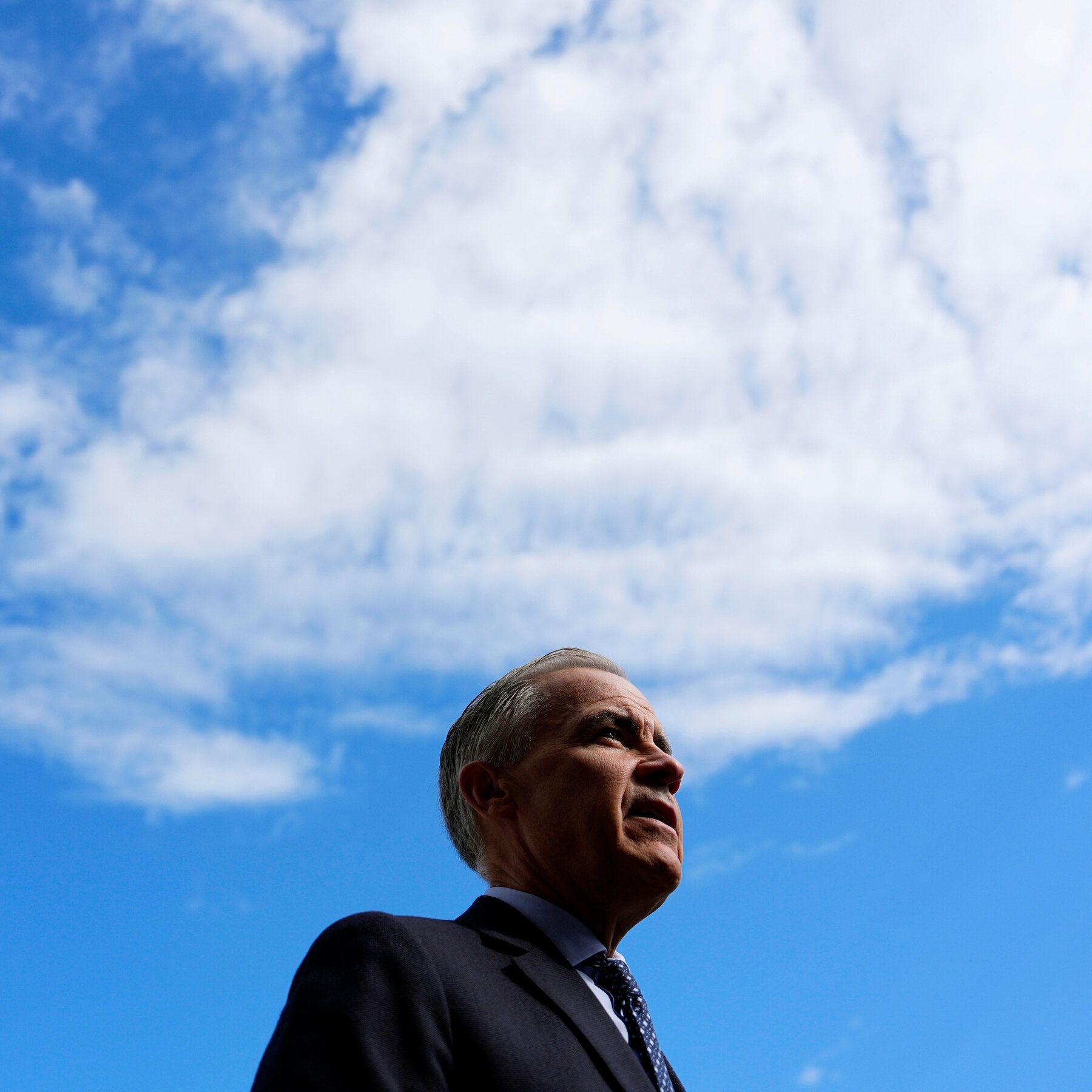 Prime Minister Mark Carney of Canada speaking with reporters in Ottawa on Tuesday. - nytimes.com