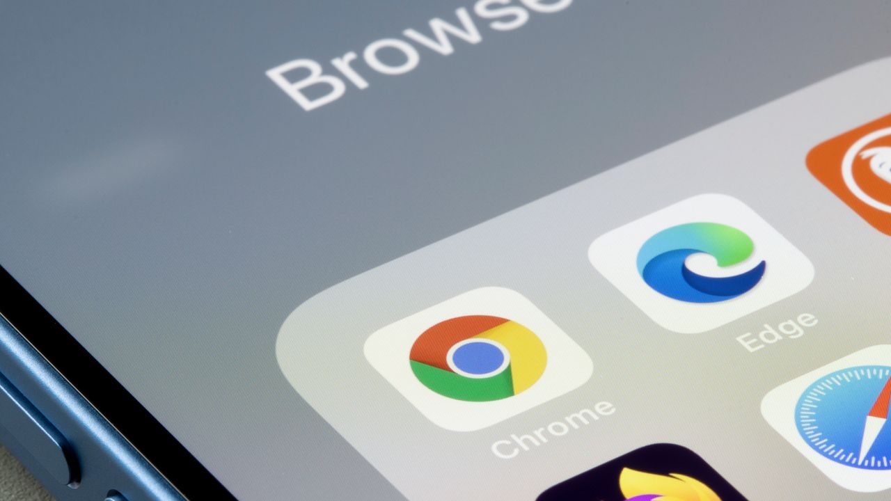 Google Chrome app is seen on an iPhone next to Edge and other web browser apps. - techradar.com