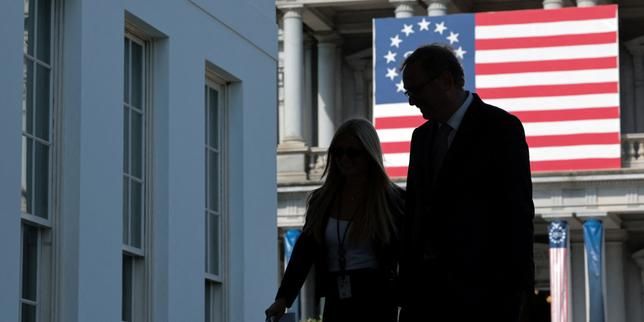 White House National Economic Adviser Kevin Hassett walks with an aide after speaking with reporters about recently released jobs numbers at the White House on September 4, 2026. - Reuters