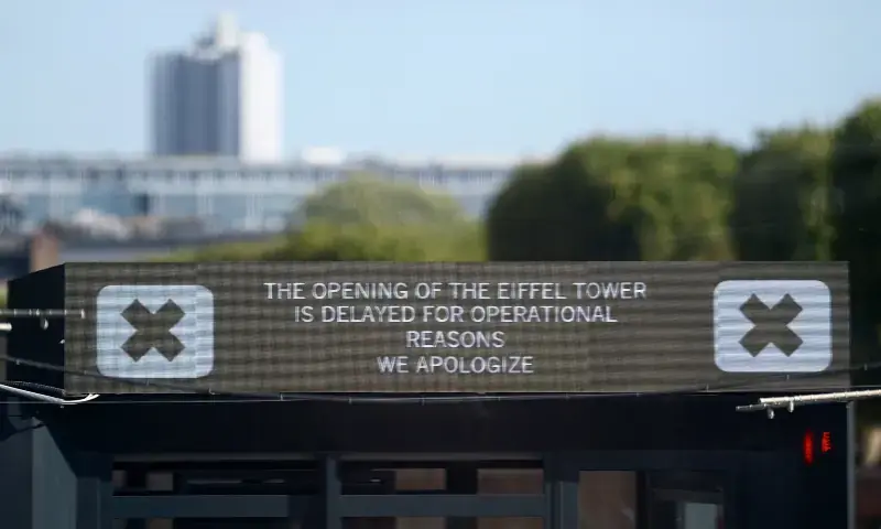 A sign reading “the opening of the Eiffel Tower is delayed for operational reasons, we apologize” is seen at the Eiffel Tower in Paris, France, on Sept 7, 2026. - Reuters