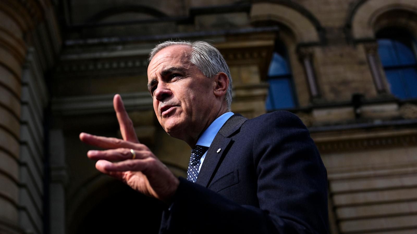 Canadian Prime Minister Mark Carney speaks with members of the media in Ottawa during the trade dispute. - Justin Tang/The Canadian Press via AP