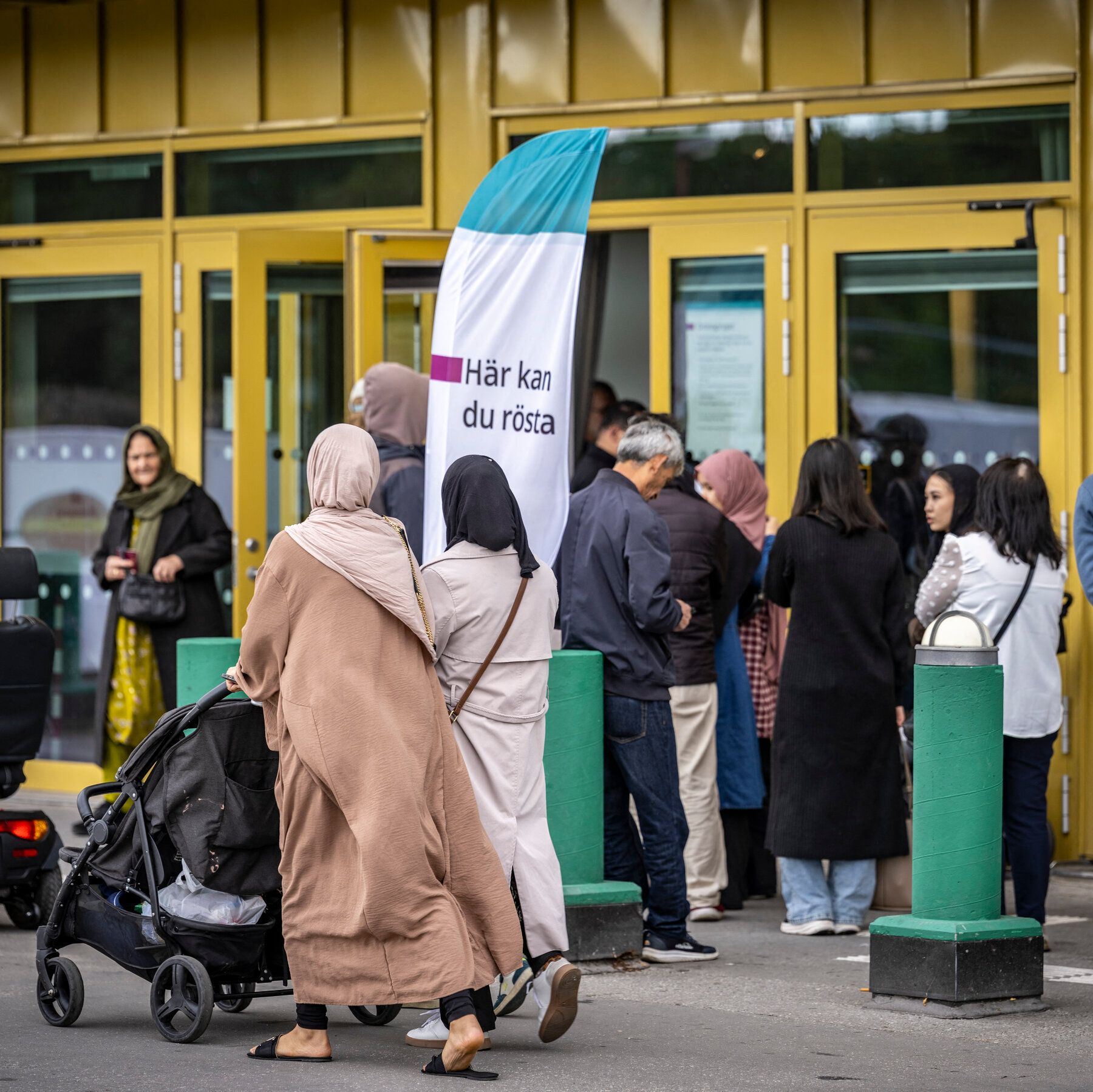 Voters cast early ballots at a polling station in Rosengard, Sweden. - The New York Times