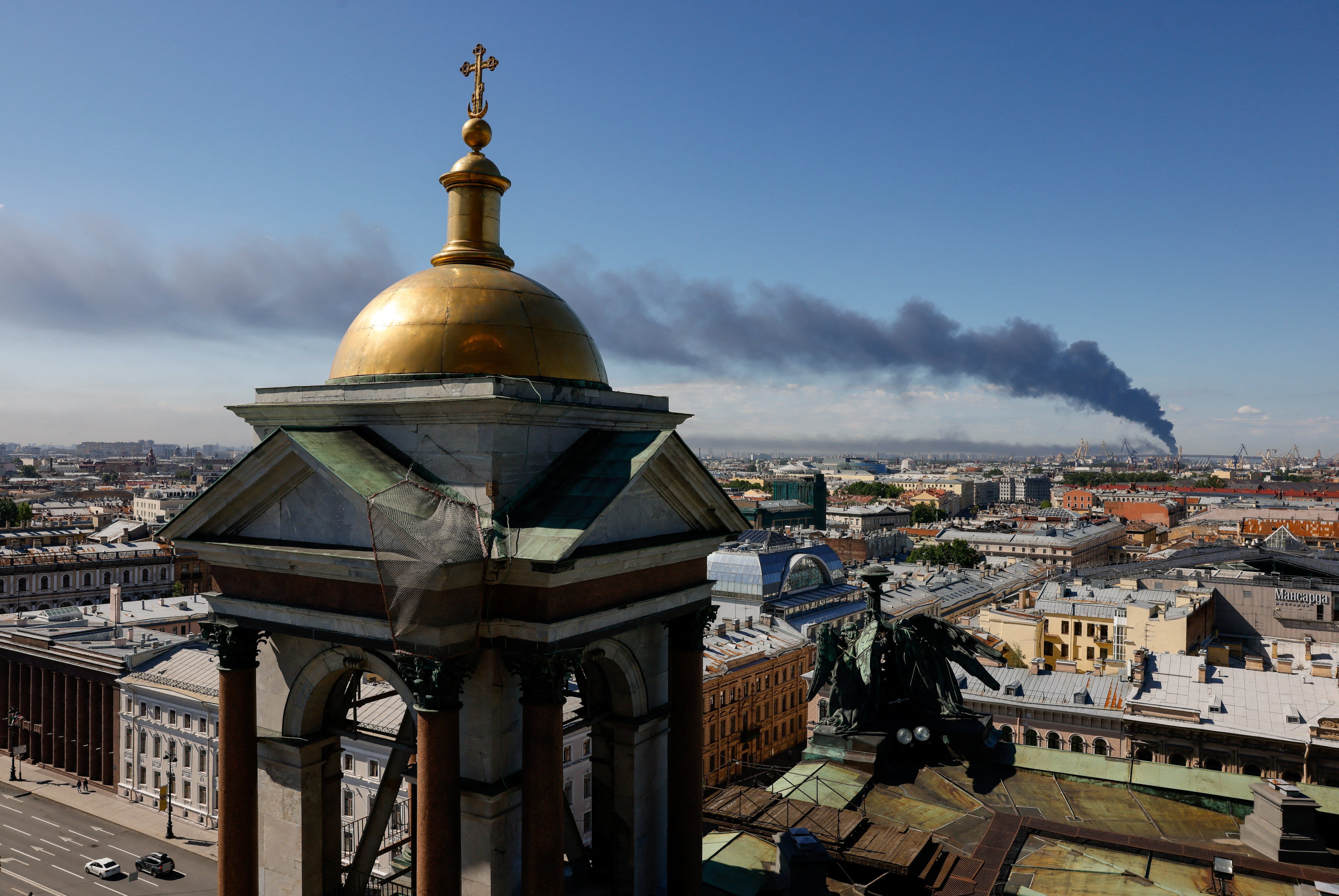 Heavy smoke billows after Ukrainian drones hit infrastructure in St. Petersburg, Russia. - Reuters